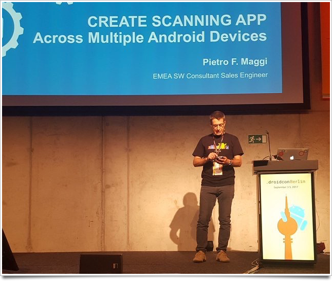 On stage at the barcamp presenting: Barcode scanning on Android